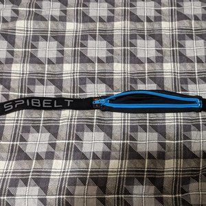 Lightly Used Black and Teal SPI-Belt - Stylish Convenience for On-the-Go!